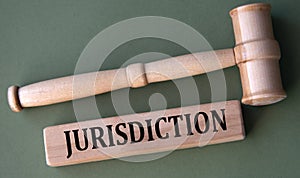 JURISDICTION - word on wooden blocks on a white background with a judge's gavel photo