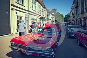 Jurmala, Latvija - 06.06.2018 Vintage classic car Old and stylish Muscle car. Red color oldschool car