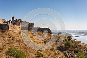 Juromenha castle and Guadiana river and border with Spain on the side of the river at sunrise, in Portugal