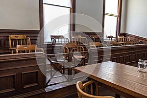 Jury Box And Defendant Table In Courtroom photo