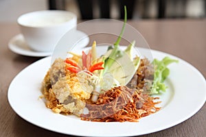 Jusmine rice in iced water such deep fried pork Authentic Thai food