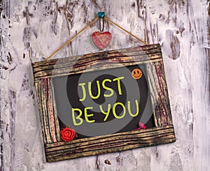 Just be you written on Vintage sign board