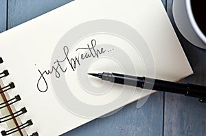 JUST BREATHE hand-lettered in notepad photo