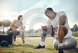 Just a couple of overachievers. Full length shot of a young athletic couple exercising together outdoors.