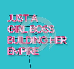 Just a girl boss building her empire pink neon signon blue background. Modern feminism quote isolated on blue background. Modern photo