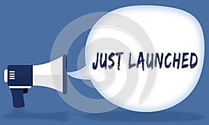 JUST LAUNCHED writing in speech bubble with megaphone or loudspeaker.