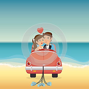 Just married couple in the beach with car