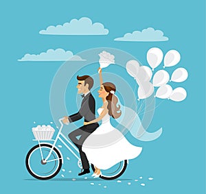 Just married happy couple bride and groom riding bicycle