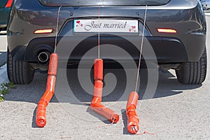 Just Married Sign Attached On Car`s Trunk