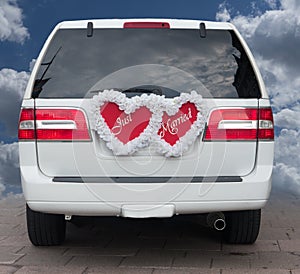 Just married sign on limousine