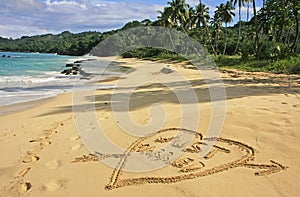 Just married written in sand