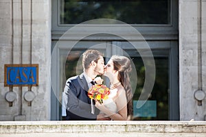 Just married young couple posing in wedding photo