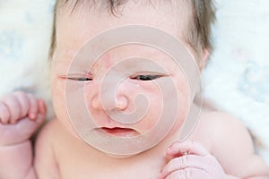 Just newborn infant baby portrait in first day of life