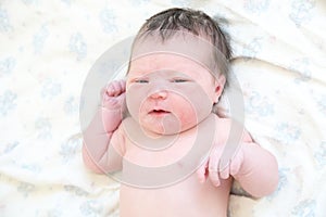 Just newborn infant baby portrait in first day of life