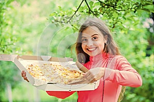 Just one slice. her favorite food. junk food concept. happy child hold big pizza. meal delivery in time. hungry kid