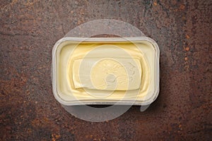 Just opened margarine box on the Table.