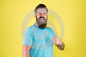 Just perfect. Man bearded hipster with mustache. Beard mustache grooming guide. Hipster handsome bearded guy yellow