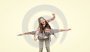 Just play, enjoy flight. Small child and bearded man playing pilots. Happy family enjoy playing together. Photo studio