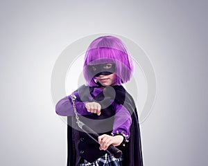 Just saving the world. A studio shot of a confident little girl playing dress-up.