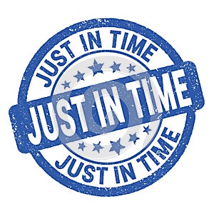 JUST IN TIME text written on blue round stamp sign