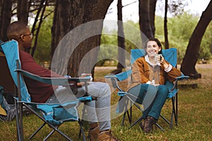 Just the two of us and the beautiful sounds of nature. a young couple camping in the wilderness.