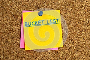 bucket list postit on corkboard