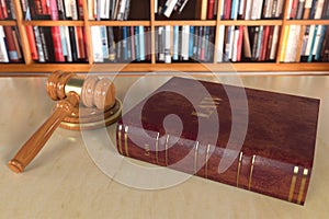 Justice books with wooden judges gavel on table in a courtroom or enforcement office Law concept. 3d rendering