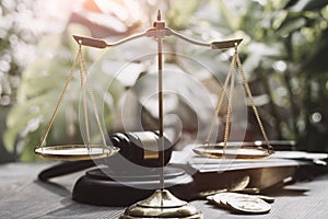 Justice and law concept.Male judge in a courtroom with the gavel, working with, computer and docking keyboard, eyeglasses, on