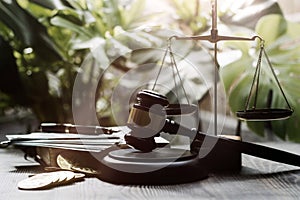 Justice and law concept.Male judge in a courtroom with the gavel, working with, computer and docking keyboard, eyeglasses, on