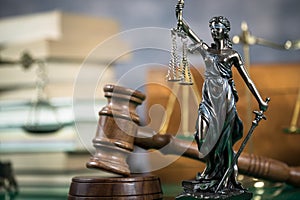 Justice and Law concept photo. Symbols of law. Brown background