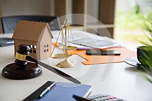 Justice law Scales and books and wooden tool on desk in  Lawyer office.concept