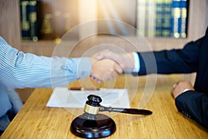 Justice lawyers Handshake to businessman or client