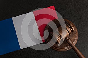 Justice mallet and France flag. Constitutional law. French legislation