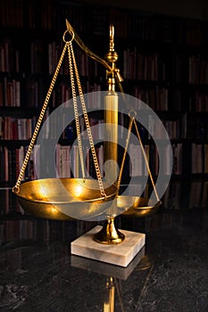 Justice scale with law books