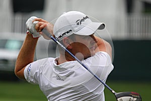 Justin Rose plays a shot