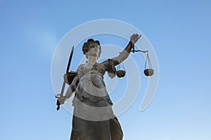 Justitia Lady Justice Skulptur at the Roemerberg  in Frankfurt photo