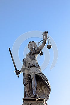 Justitia Lady Justice Skulptur at the Roemerberg  in Frankfurt photo