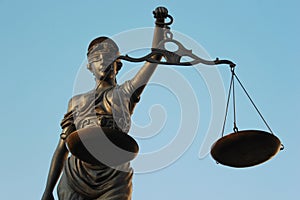 Justitia poetic justice