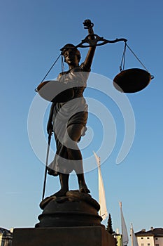 Justitia poetic justice