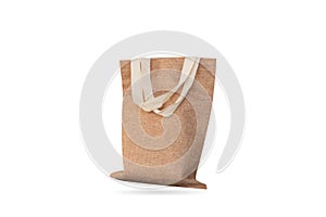 A jute bag full of money isolated on a white background.