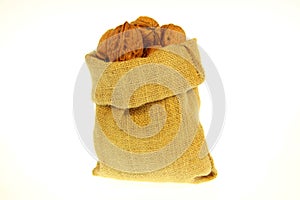 Jute bag full of walnuts