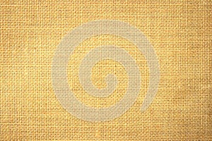 Jute hessian sackcloth burlap canvas woven texture background pattern in light beige cream brown color blank. Natural weaving