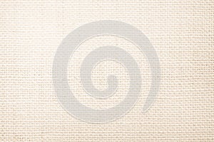 Jute hessian sackcloth burlap canvas woven texture background pattern in light beige cream brown color blank. Natural weaving