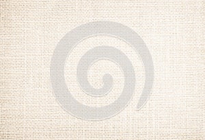 Jute hessian sackcloth burlap canvas woven texture background pattern in light beige cream brown color blank. Natural weaving