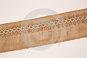 Jute natural sackcloth strip isolated on white background
