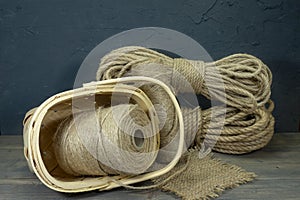 Jute rope and spools of burlap threads or twine