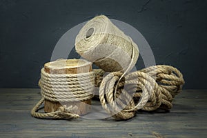 Jute rope and spools of burlap threads or twine