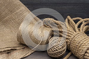 Jute rope and spools of burlap threads or twine