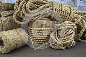 Jute rope and spools of burlap threads or twine