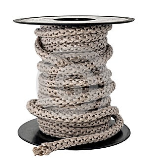 Jute rope is wound on a plastic spool on a white background. Rope isolate